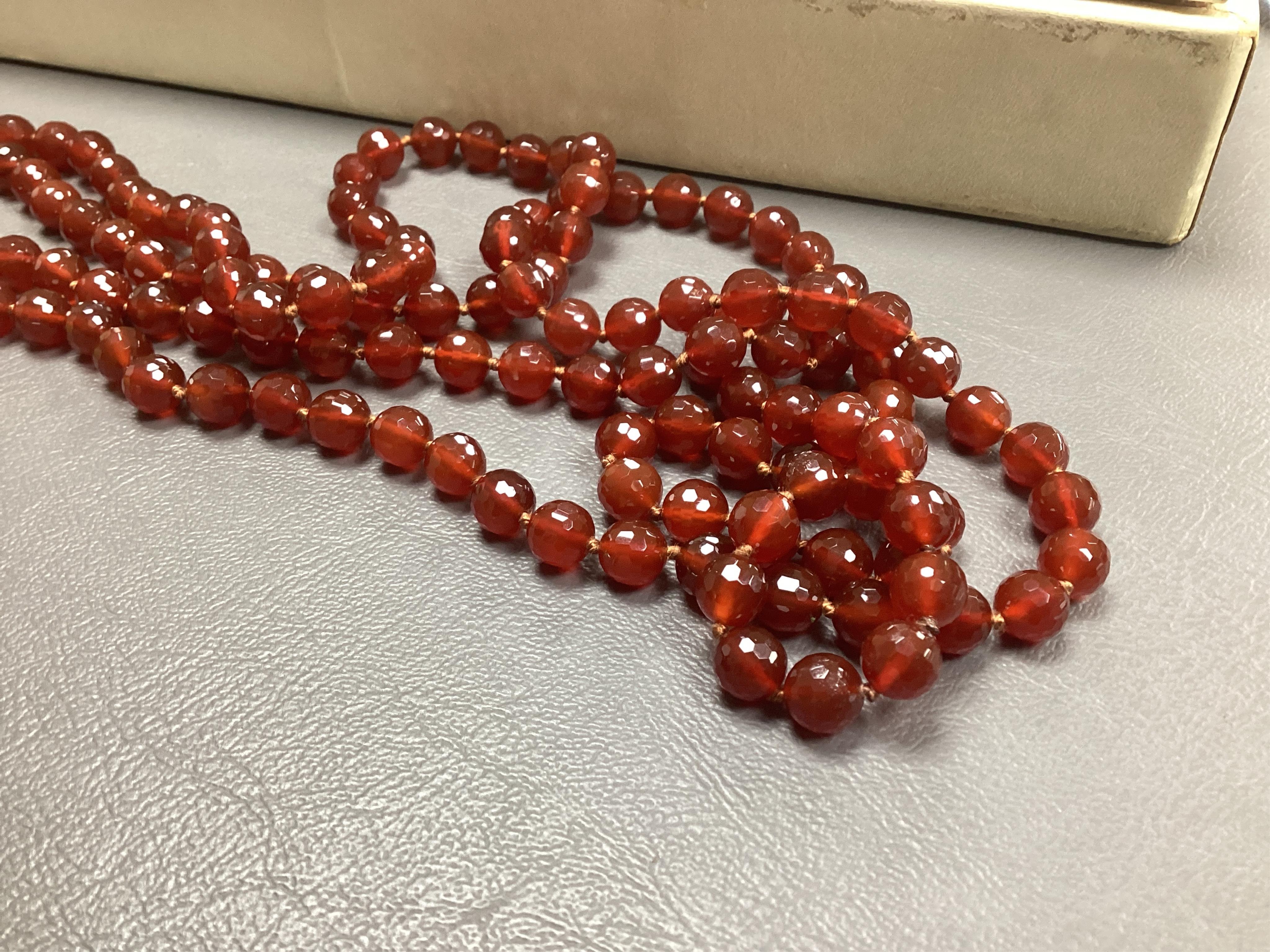 A collection of jewels and accessories, comprising: an Edwardian seed pearl heart-shaped locket in gold, length 2.1cm, stamped 9ct, gross weight approximately 3.5 grams; a coral and cultured pearl bracelet in 9ct gold, l